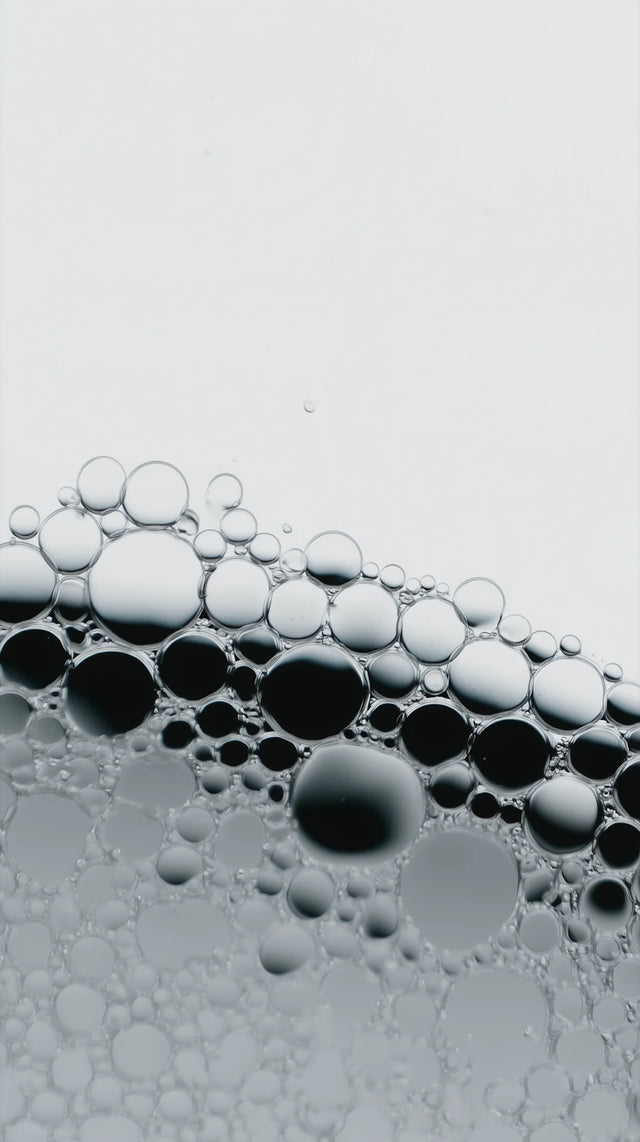 Close-up of bubbles on a gray background