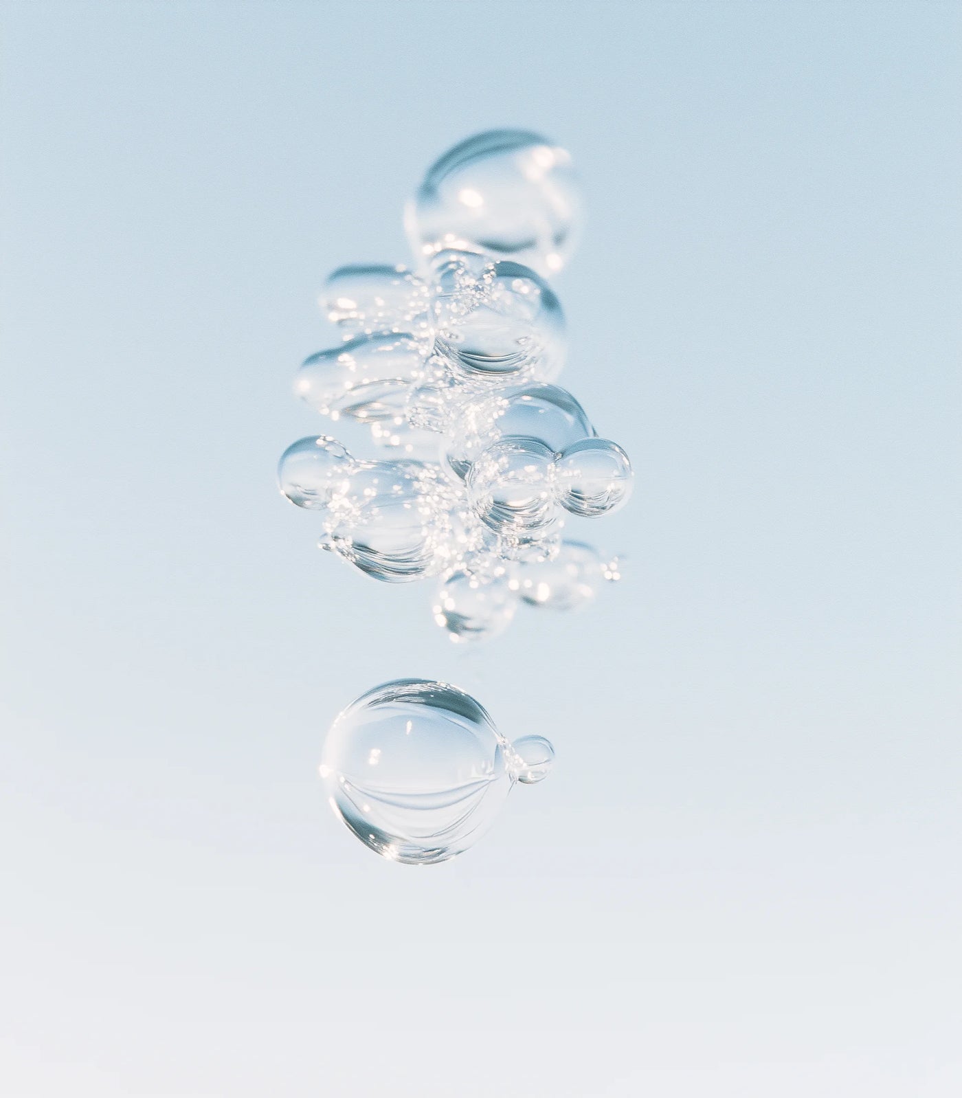 Clear bubbles against a light blue background