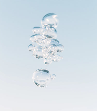 Clear bubbles against a light blue background