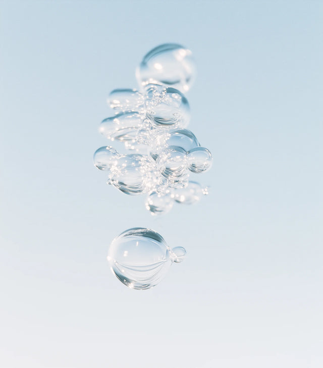 Clear bubbles against a light blue background