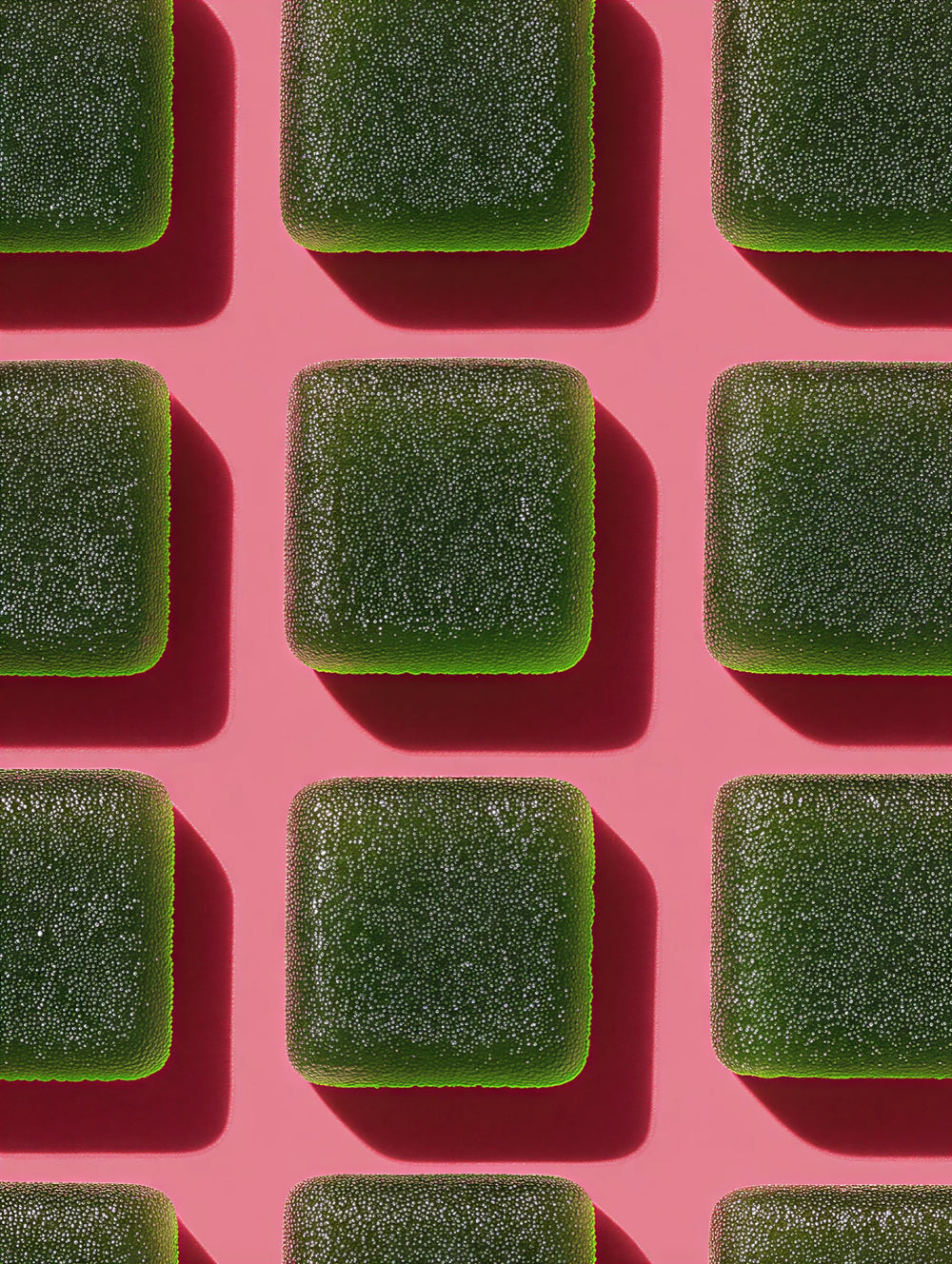 Green square-shaped objects on a pink background