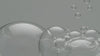 Soap bubbles on gray background
